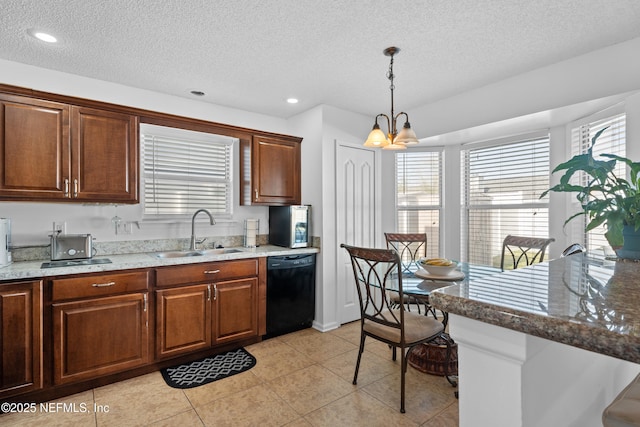 kitchen with sink, black dishwasher, pendant lighting, a chandelier, and light tile patterned floors