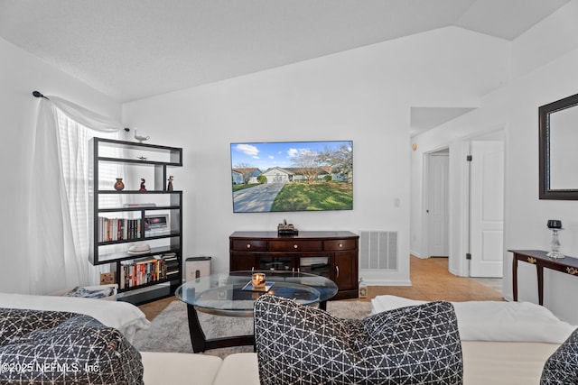 bedroom featuring lofted ceiling