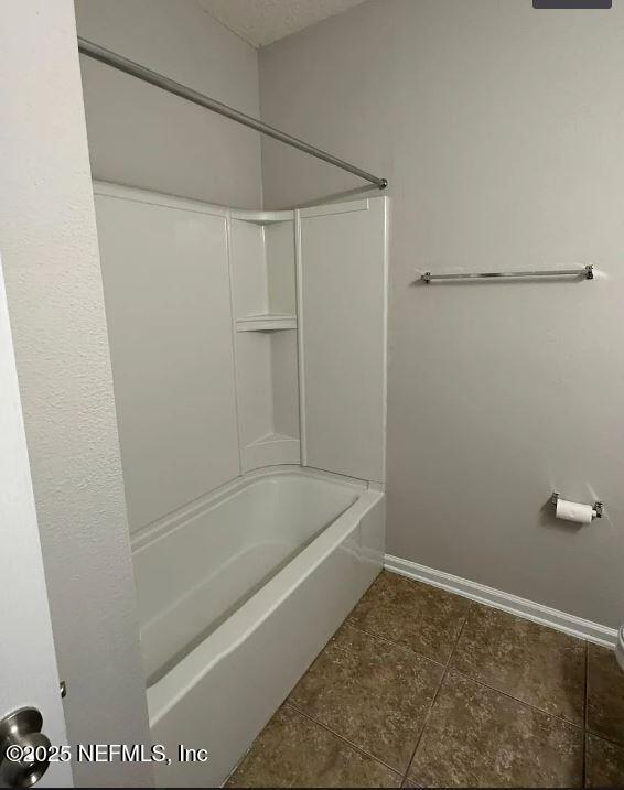 bathroom featuring shower / washtub combination