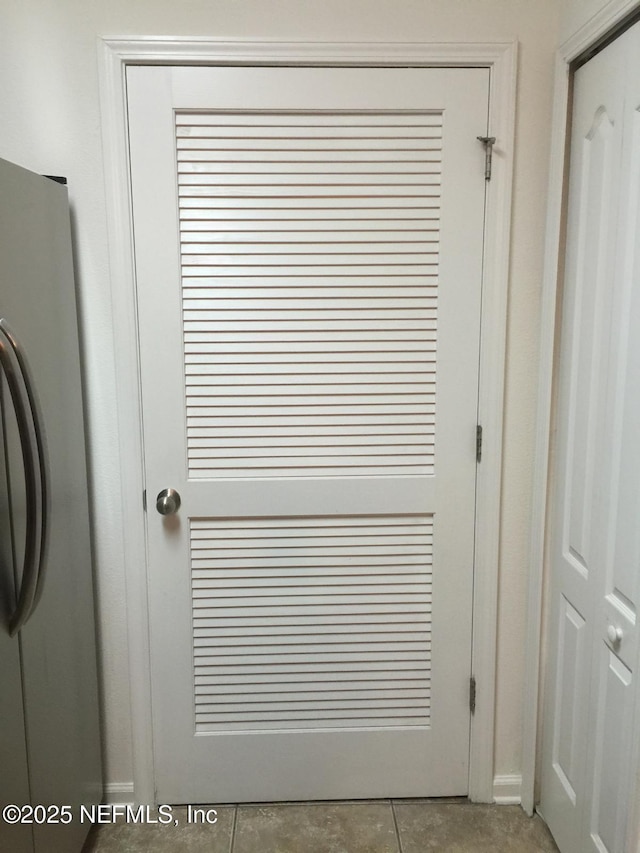 room details featuring stainless steel refrigerator