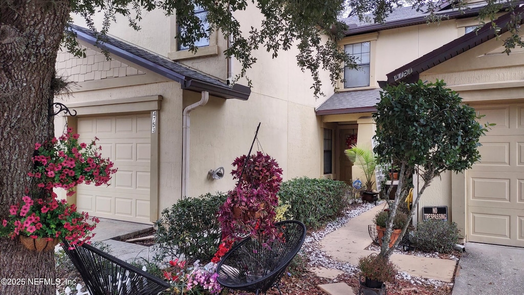 entrance to property featuring a garage