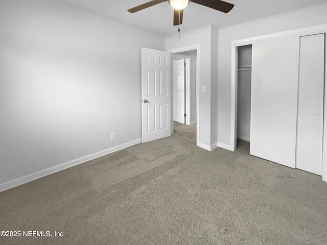 unfurnished bedroom featuring carpet flooring, ceiling fan, and a closet