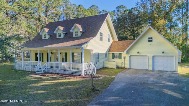 cape cod house with a front yard, a porch, and a garage