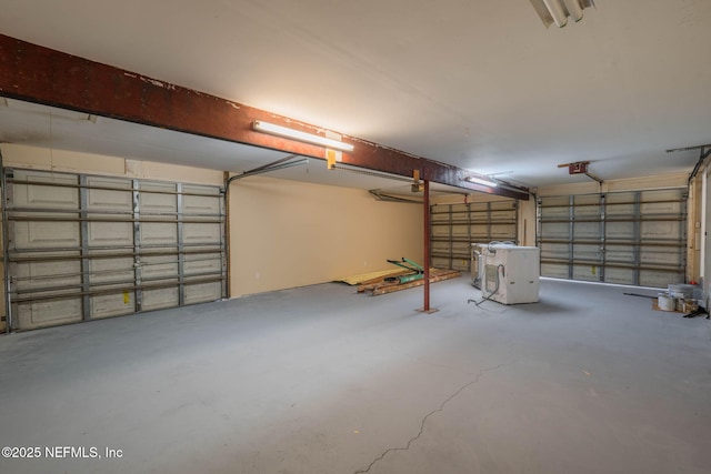 garage featuring washer / clothes dryer