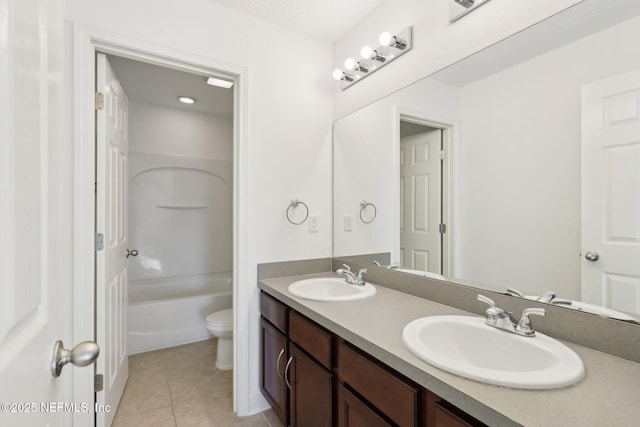 full bathroom with toilet, bathtub / shower combination, vanity, and tile patterned floors