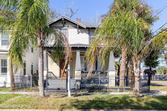 view of front of property featuring covered porch