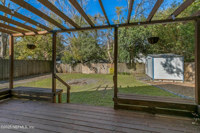 exterior space with a pergola, a yard, and a storage unit