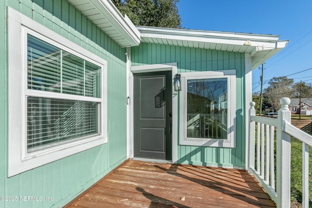 property entrance with a deck