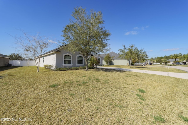 view of front of home with a front lawn