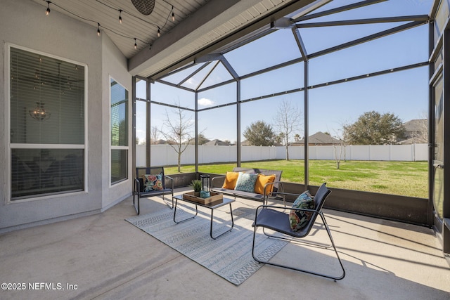 view of patio / terrace featuring a lanai, an outdoor hangout area, and ceiling fan