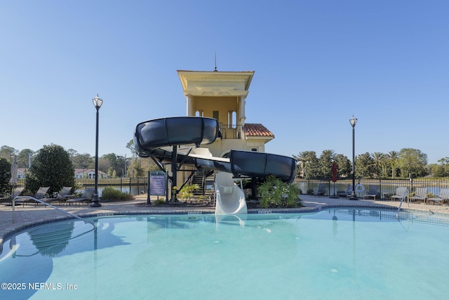 view of swimming pool featuring a water slide