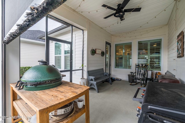 view of patio featuring ceiling fan