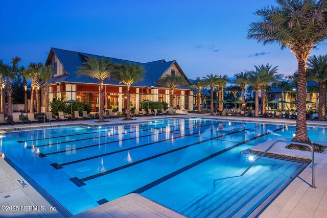 community pool featuring a patio area