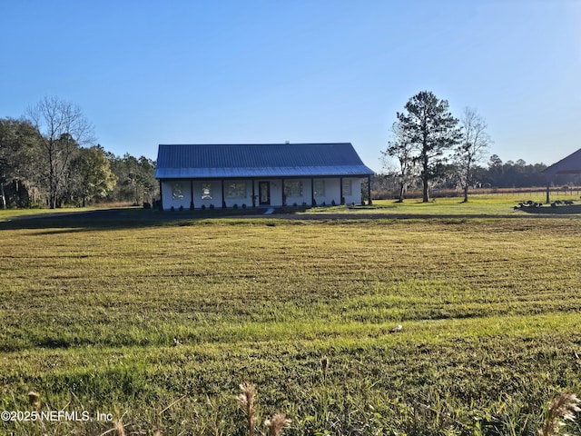 view of yard featuring covered porch