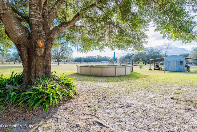 view of yard with a carport