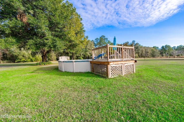 exterior space featuring a pool side deck