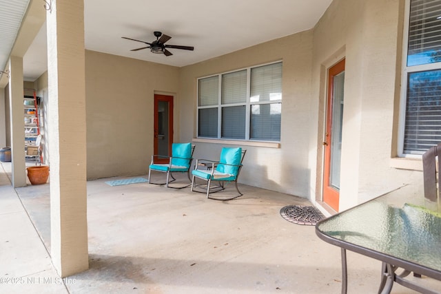 view of patio with ceiling fan