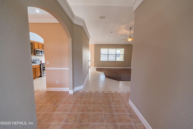 hallway with light tile patterned floors