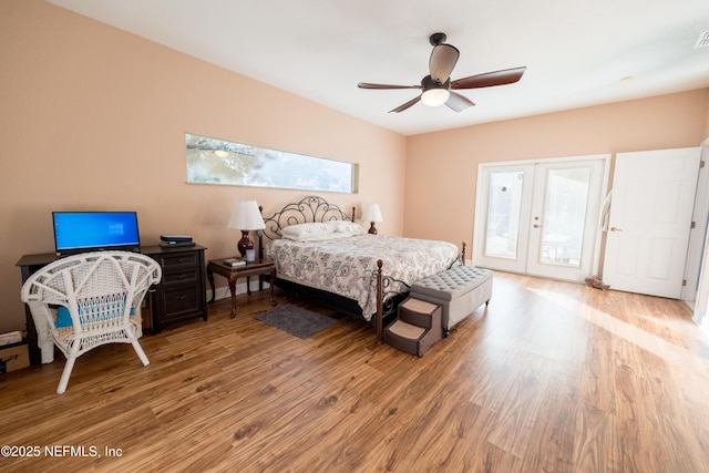 bedroom with ceiling fan, light hardwood / wood-style flooring, access to outside, and french doors