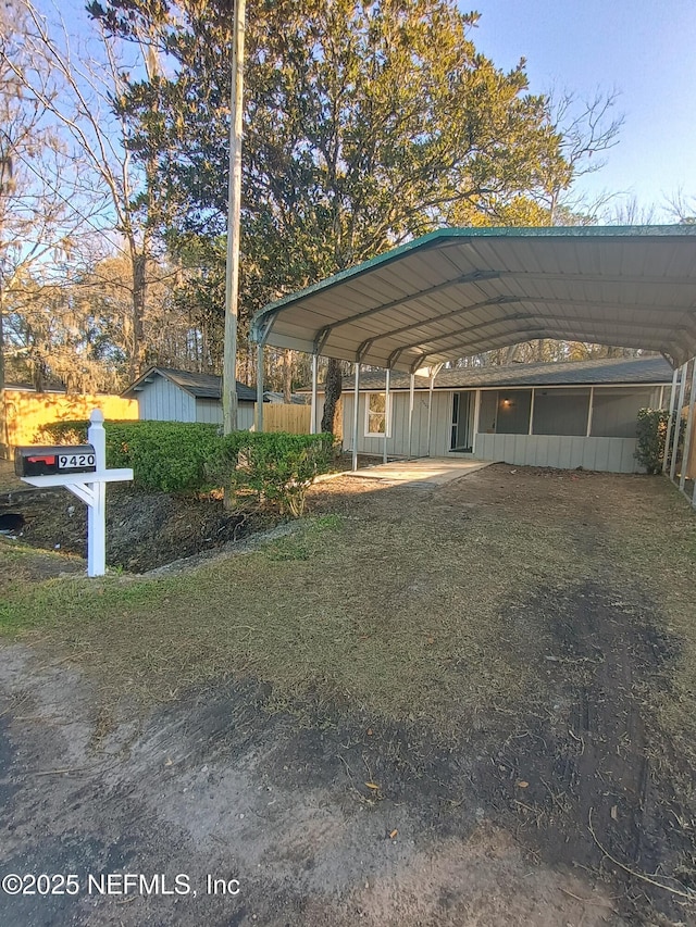 view of car parking with a carport