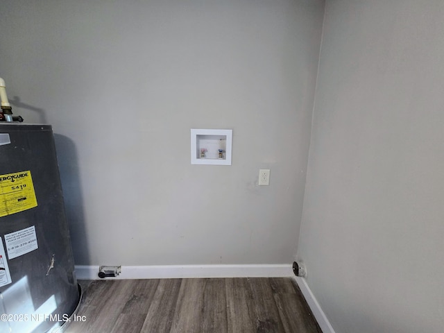 laundry area with hardwood / wood-style floors, electric water heater, and hookup for a washing machine