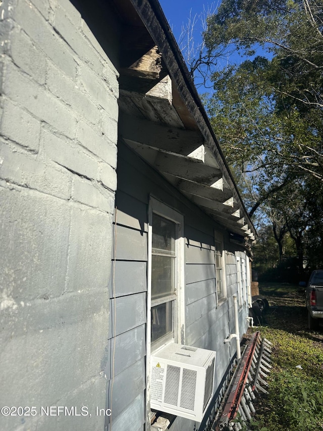 view of home's exterior featuring cooling unit