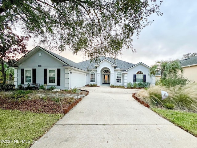 ranch-style house with a garage