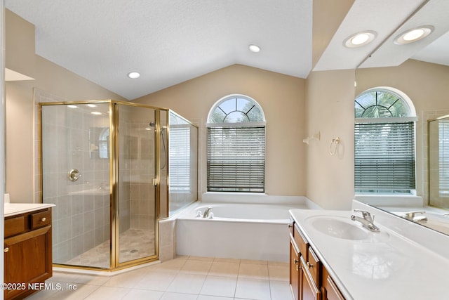 bathroom featuring lofted ceiling, separate shower and tub, and tile patterned flooring