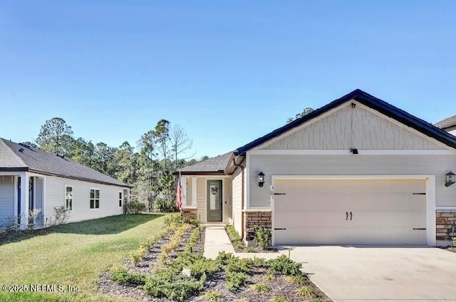 view of front facade with a garage and a front lawn