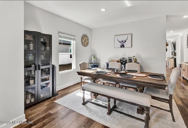 dining room featuring dark wood-type flooring