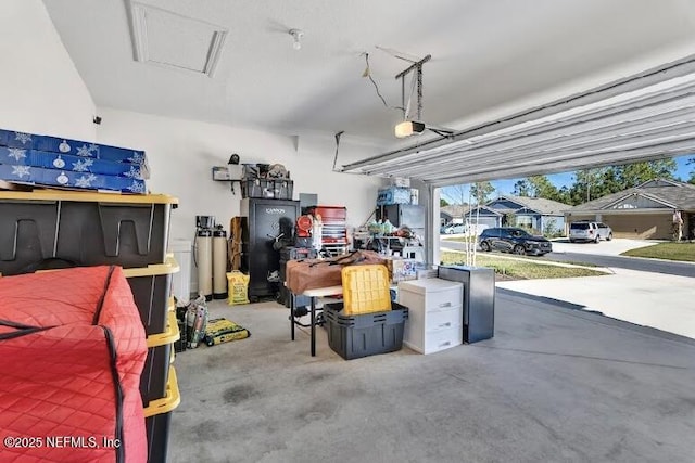 garage featuring a garage door opener