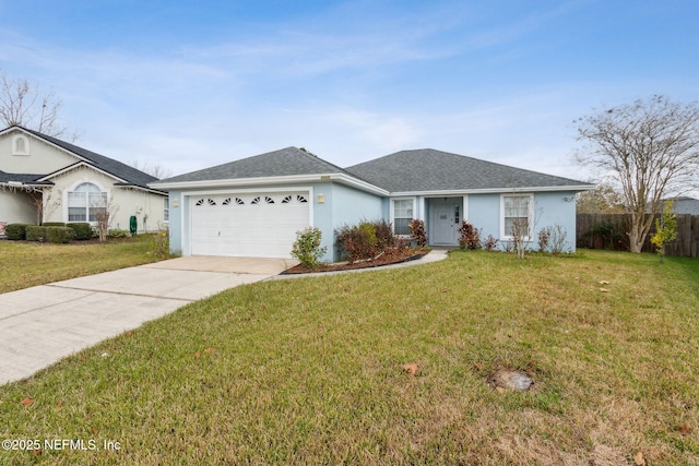 ranch-style house with a garage and a front lawn