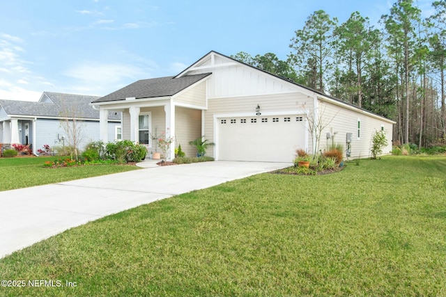 view of front facade with a front yard and a garage