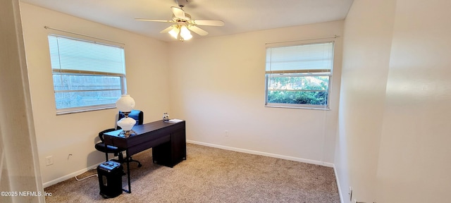 office featuring light colored carpet and ceiling fan