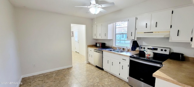 kitchen featuring ceiling fan, sink, white cabinets, and appliances with stainless steel finishes