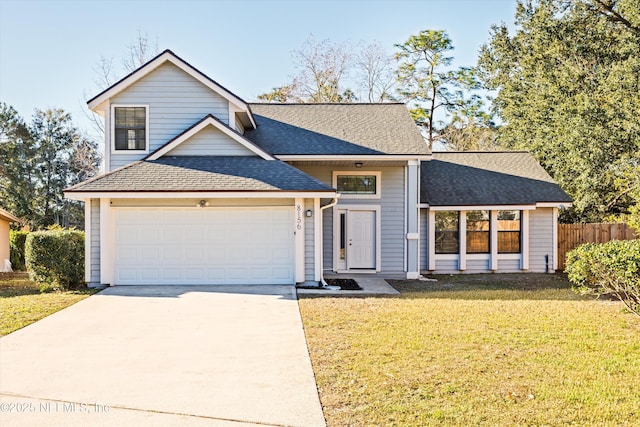 view of property featuring a front lawn