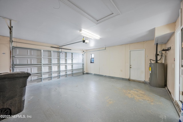 garage featuring water heater and a garage door opener