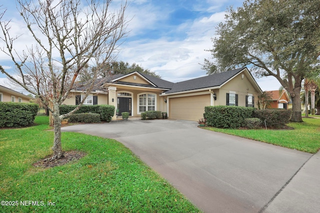 ranch-style home featuring a front yard and a garage