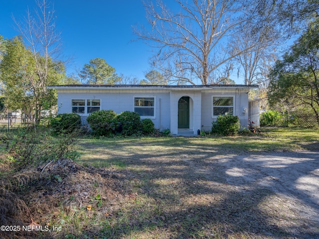 ranch-style house with a front yard