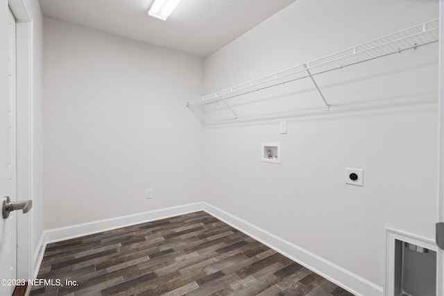 washroom with washer hookup, dark hardwood / wood-style floors, and hookup for an electric dryer