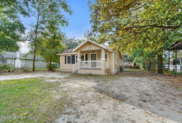 bungalow-style home featuring covered porch