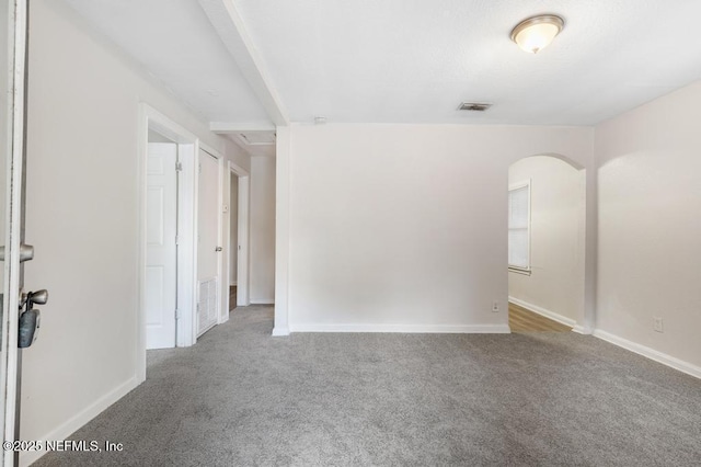 unfurnished room featuring carpet flooring