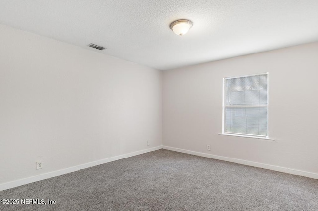 spare room with carpet flooring