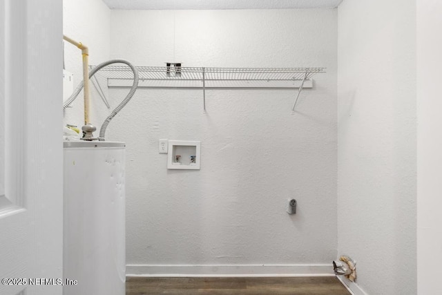 washroom featuring wood-type flooring and water heater