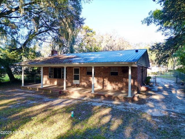 view of front of home featuring a patio