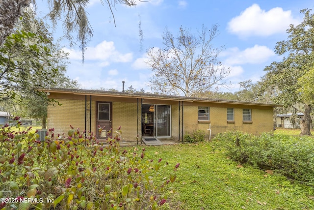 back of property featuring cooling unit