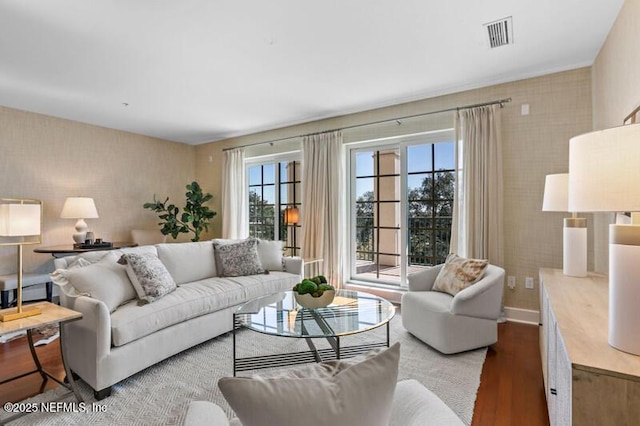 living room featuring hardwood / wood-style flooring and a wealth of natural light