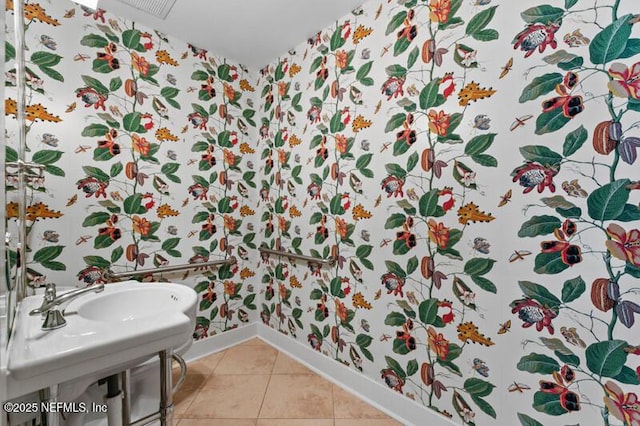 bathroom with tile patterned flooring