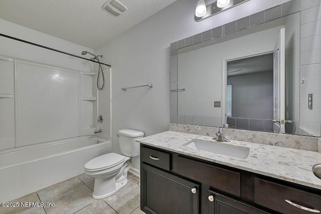 full bathroom with vanity, bathing tub / shower combination, tile patterned floors, toilet, and a textured ceiling