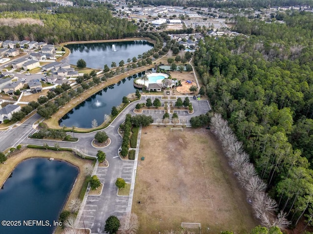 bird's eye view with a water view